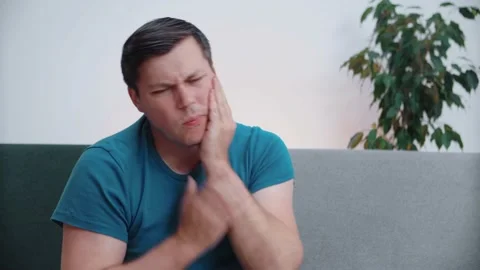 Portrait of a man with a toothache. A problem with a bad tooth. Stock Footage 146541381