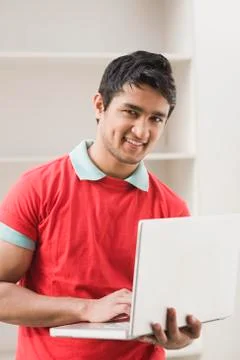 Portrait of a man using a laptop Fotos Stock