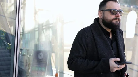 Portrait of a Man Using the Voice Recognition of The Phone Stock Footage 122034531