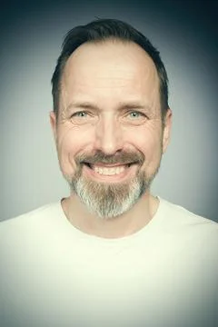 Portrait of man's face in studio when trying expressions Stock Photos
