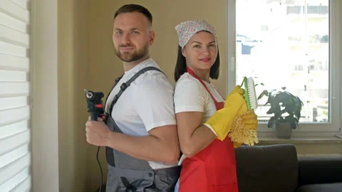Portrait of a married couple preparing for a general cleaning or renovation in Stock Footage 163014762
