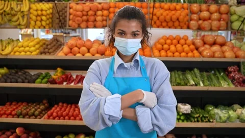 Portrait of masked store owner posing on camera Stock Footage 157167038