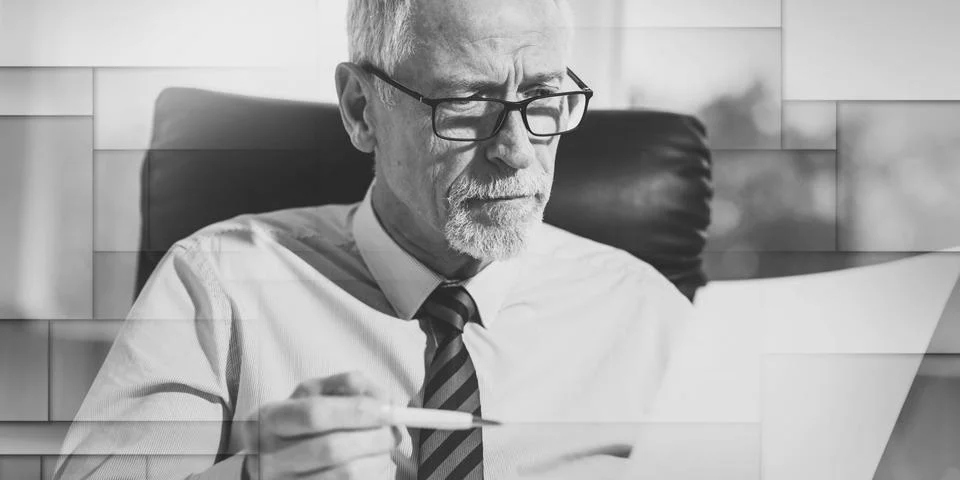Portrait of mature businessman checking a document, geometric pattern Stock Photos