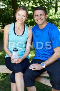Portrait Of Mature Couple Exercising In Countryside Together Stock Photos