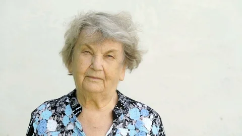 Portrait of mature old gramma outdoors Stock Footage
