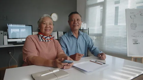 Portrait of Mature Spouses Attending Computer Class Stock Footage 263702956