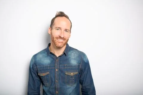 Portrait of a men in studio gray background Foto stock