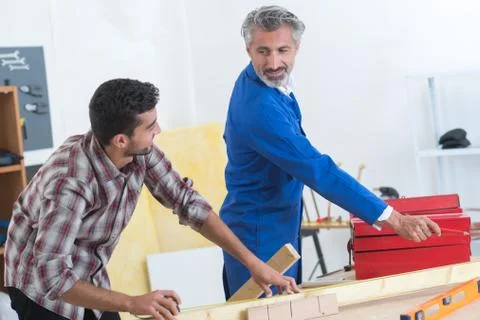Portrait of men in workshop Stock Photos