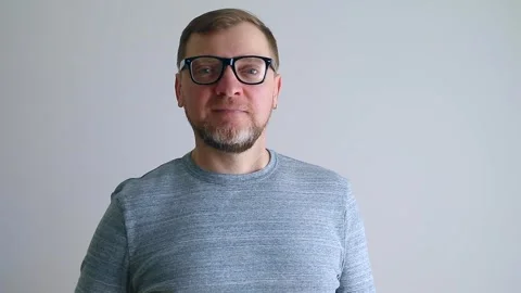 Portrait of a middle aged 40 years old man with glasses looking at the camera. Stock Footage 240108315
