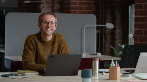 Portrait of Middle-Aged Male Developer with Laptop in Modern Office Stock Footage 319995807