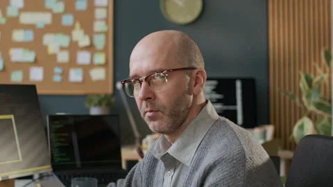 Portrait of Middle-Aged Male Programmer Working in Modern Office Stock Footage 306836500