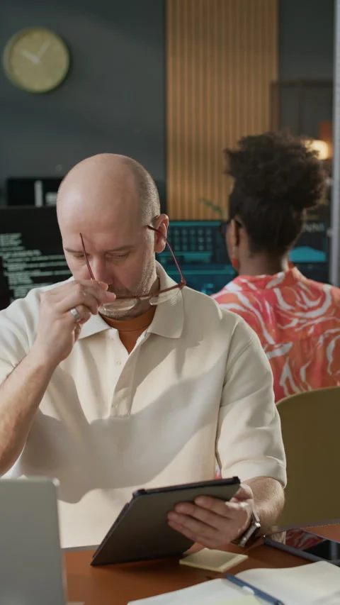 Portrait of Middle-Aged Male Programmer Working in Open Space Office Stock Footage 306848802