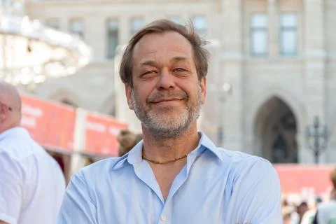 Portrait of a middle-aged man with a beard against the background of urban ar Fotos Stock