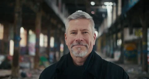 Portrait of middle aged man looking in the camera and smiling. Stock Footage 300790966