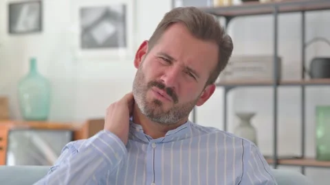 Portrait of Middle Aged Man with Neck Pain at Home Stock Footage 287897536