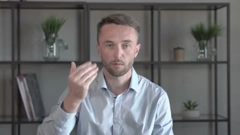 Portrait of Middle Aged Man Pointing Finger and Inviting Video stock 133369139
