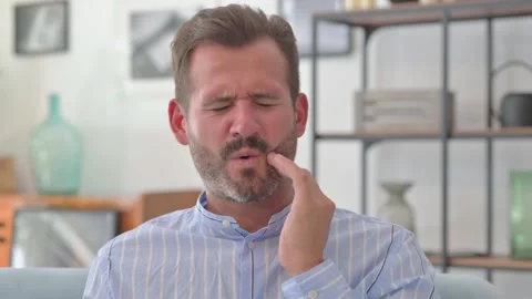 Portrait of Middle Aged Man with Toothache at Home Stock Footage 287897526