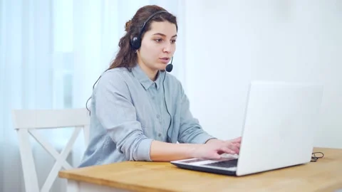 Portrait millennial female student studying online via internet while sitting  Stock Footage 145244782