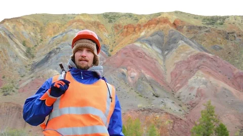 Portrait of a mining engineer, a geologist in the protective reflective vest Stock Footage 79082116