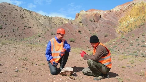 Portrait of a mining engineer, a geologist in the protective reflective vest Stock Footage 79521937