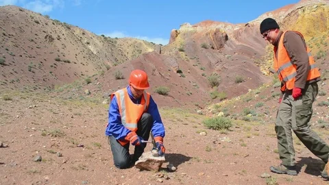 Portrait of a mining engineer, a geologist in the protective reflective vest Stock Footage 84565797