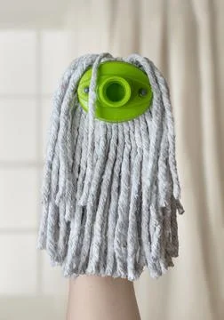 Portrait of a model from a mop head. Stock Photos