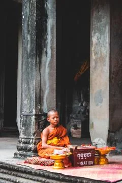 A portrait of a monk inside the Temples of Angkor Wat Stock Photos