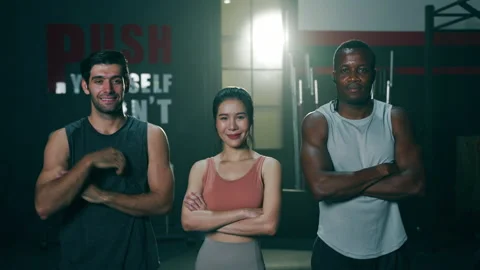 Portrait of Multi ethnic group of young athlete looking at camera show thumbs up Video stock 151607463