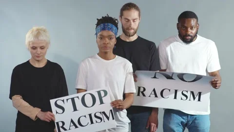 Portrait multi-ethnic people protesting for equal rights hold poster No racism Stock Footage 133641594