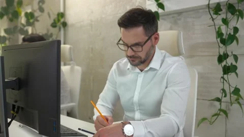 Portrait of multiethnic group of professional programmers coding using computers Stock Footage 228932846
