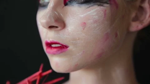 Portrait of mysterious girl with creative make-up and elegant hairstyle Video stock 73975053