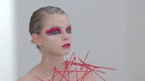 Portrait of mysterious girl with creative make-up and elegant hairstyle Stock Footage