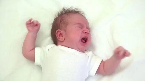 Portrait of newborn crying, babies language Stock Footage