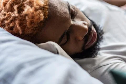 Portrait of a nice handsome man while sleeping Stock Photos