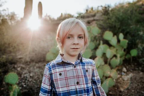 Portrait of non binary child in the desert Stock Photos