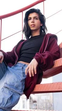 Portrait of a non-binary person posing for the camera. Stock Photos