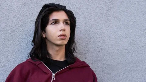 Portrait of a non-binary person posing for the camera. Stock Photos