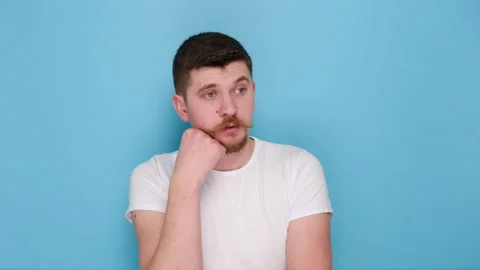 Portrait of offended man spreading hands, negative mood, unhappy expression Stock Footage 147545543