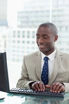 Portrait of an office worker using a computer Stock Photos