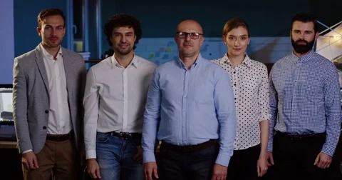 Portrait of office workers team with their boss posing in the modern office Stock Footage 82473865