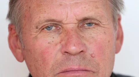 Portrait of a old man alone, looking to camera , close up Stock Footage 64773893