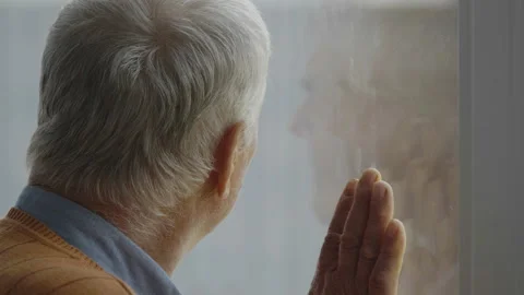 Portrait of old man face looking out window, face reflected on glass Stock Footage 141356895