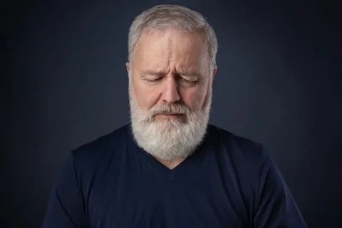 Portrait of the old man looking down Stock Photos