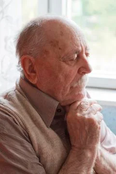 Portrait of an old man thinking Stock Photos