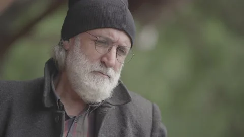 Portrait of an old man with white beard thinking. slog2 Stock Footage 141879959