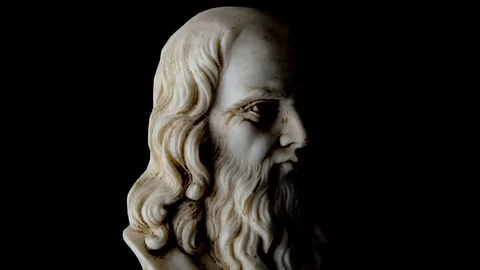 Portrait of old wise man with a beard that rotates on a black background 動画素材 123405893