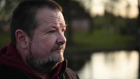 Portrait of an older man with a gray beard and wrinkles in close-up. Stock Footage 170194238