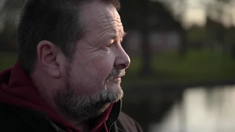 Portrait of an older man with a gray beard and wrinkles in close-up. Stock Footage 170194304