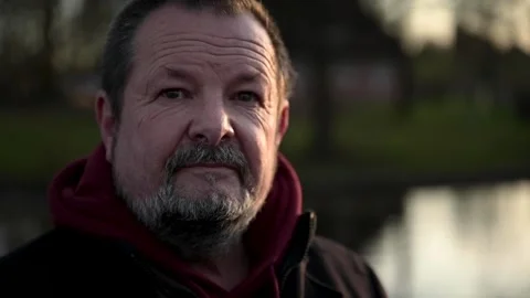 Portrait of an older man with a gray beard and wrinkles in close-up. Stock Footage 170194318
