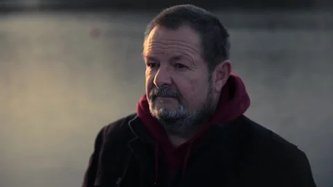 Portrait of an older man with a gray beard and wrinkles in close-up. Stock Footage 170194426